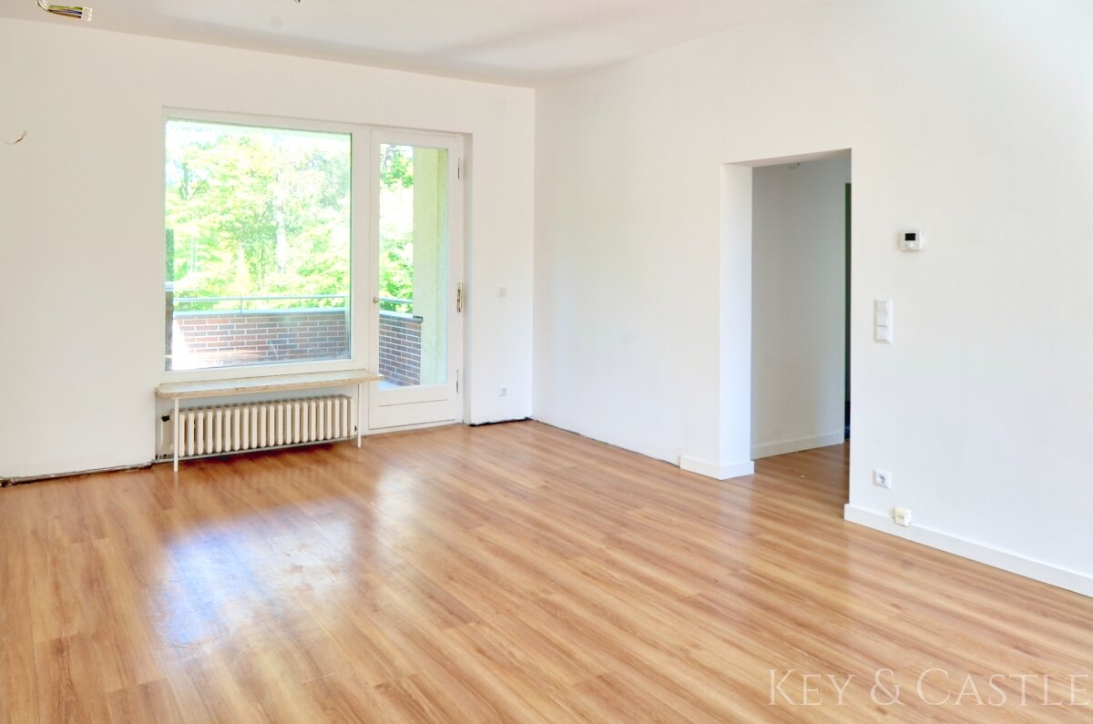 Heller Wohnbereich mit Zugang zum Westbalkon Heller Wohnbereich mit Zugang zum Westbalkon